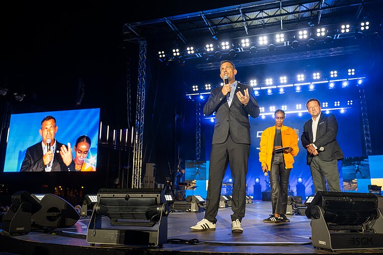 BMW BERLIN-MARATHON: Jürgen Lock and Christian Jost Managing Director of SCC EVENTS at the opening ceremony for the 50th anniversary at the Brandenburg Gate © SCC EVENTS