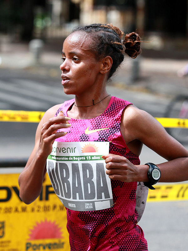Mare Dibaba (ETH) will be aiming to run a very fast time in Berlin and challenge the Kenyan duo.
